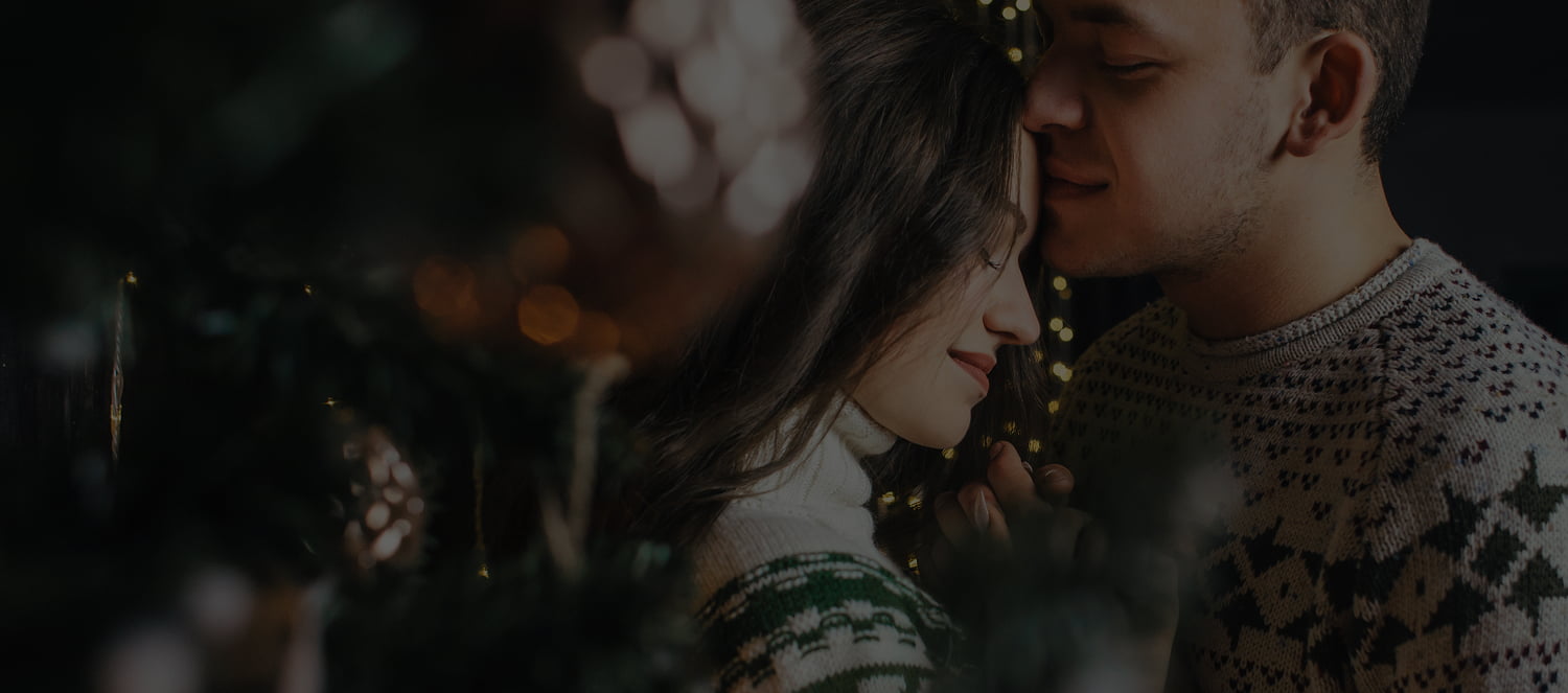 Regala ilusión Pareja con jerseis navideños